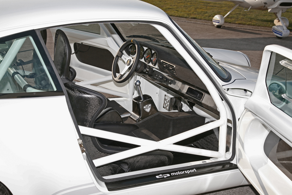 The interior features the dp 935 bucket seats the light carbon dashboard 